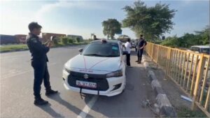 Red-blue beacon installed on car to evade toll; police take major action, fake VIP caught in Palwal.