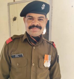 The family bid a tearful farewell; just 28 days earlier, the home had been filled with the cries of a newborn—now, the soldier, who was returning home to celebrate, has died in a road accident.